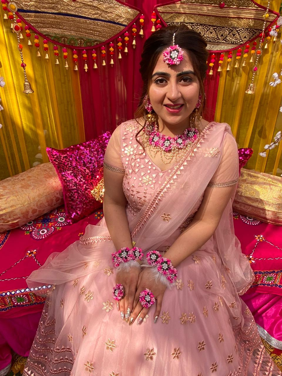 Pink feather jewellery